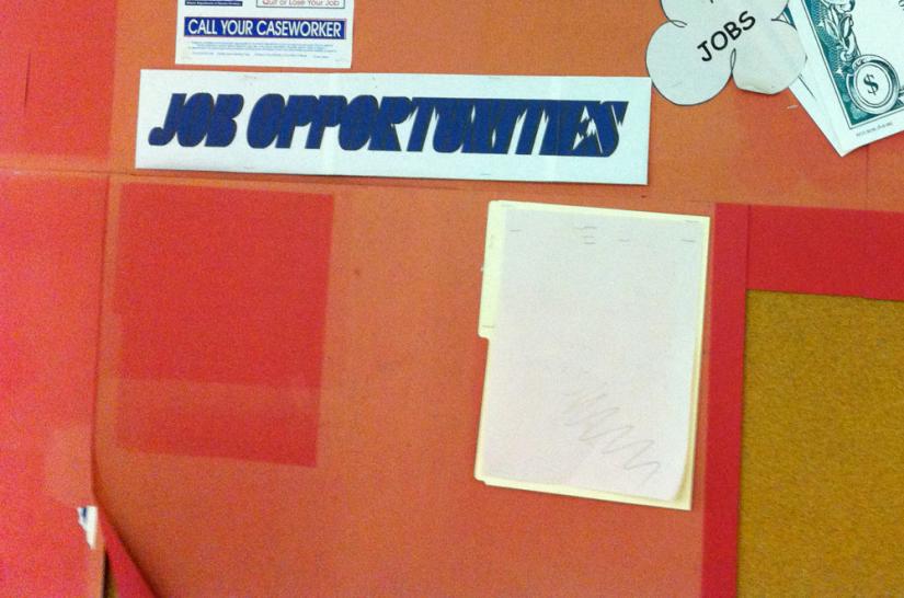 An empty job board in a Chicago public services office