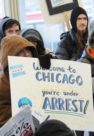 Occupy Chicago protesters rally against police violence and repression