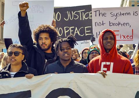 Madison marches to demand for justice for Tony Robinson