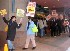Members of UNITE HERE Local 2 on the picket line during a three-day strike against the Hilton in San Francisco