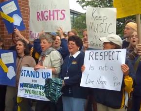 Teachers and supporters protest outside a Northampton, Mass., school committee meeting