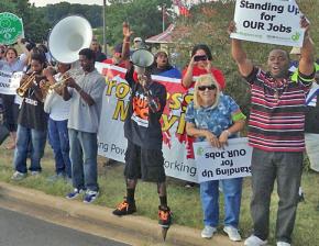 OUR Walmart supporters picket outside a store near Washington, D.C.