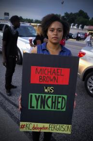 Marching along West Florissant in Ferguson, Mo.