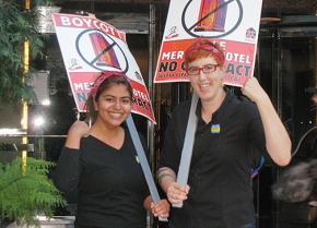Members and supporters of UNITE HERE Local 2 picket outside Le Meridien in San Francisco