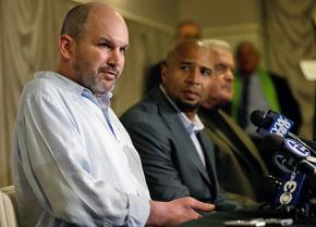 Former NFL player Kevin Turner speaks to the media