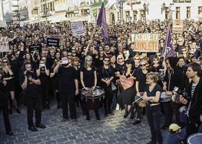Members of the left-wing Razem party rally for women's reproductive rights in Warsaw